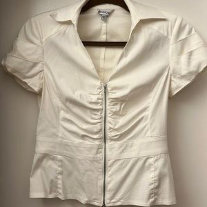 Cute Bebe blouse, zip up, fitted.